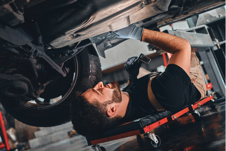 Male-Technician-Working-on-Car.jpeg Male-Technician-Working-on-Car.jpeg