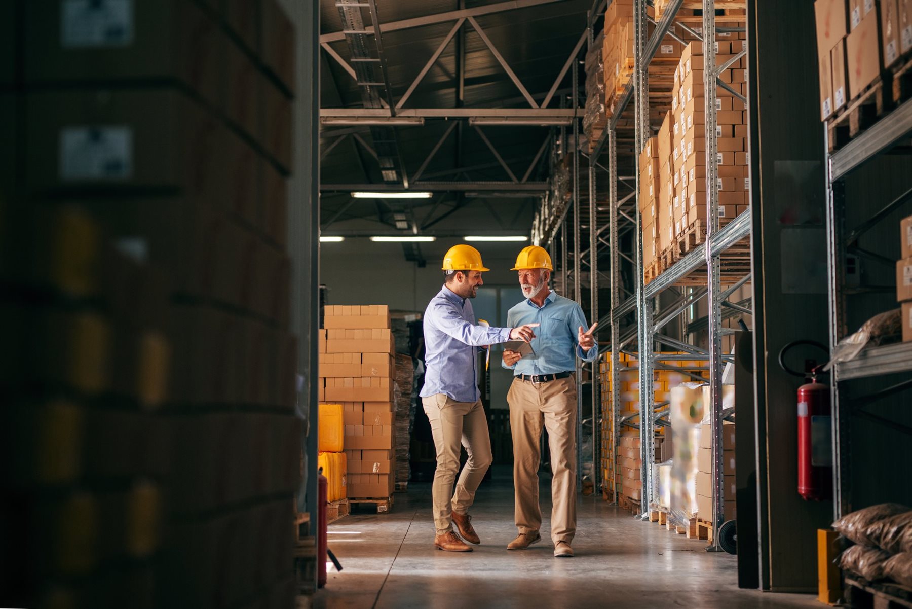 Two workers discussing Workplace Safety.